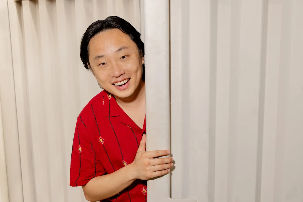 Jimmy O. Yang posing happily after EVO ICL surgery