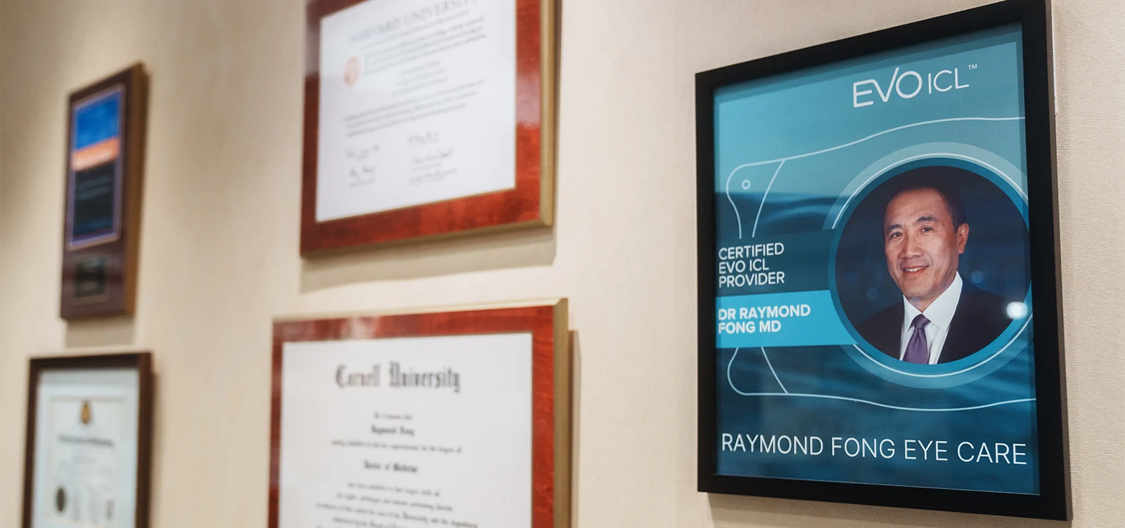 awards and certifications wall at Raymond Fong Eye Care